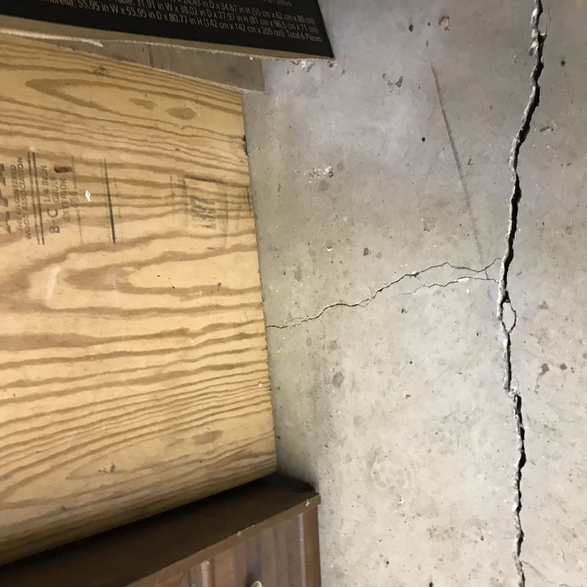 small and medium crack on concrete basement floor